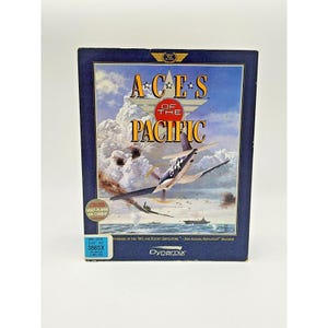 May include: A vintage computer game box titled "Aces of the Pacific." The box art depicts a World War II-era airplane in flight over the ocean, with the game's title in large, bold letters. The box also features the "Multi-Player Air Combat" logo.
