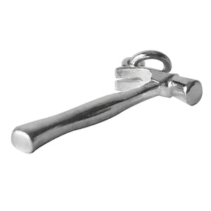 May include: A silver hammer charm with a claw and a loop for attaching to a chain or bracelet.