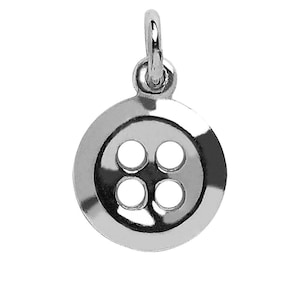 May include: A silver charm in the shape of a four-hole button.
