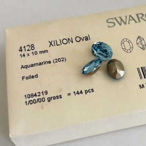 Swarovski© Crystal AQUAMARINE Oval 4120 14 x 10mm Factory Pack of 144 pieces Fancy Stone Loose Foil Backed Light Aqua Blue
