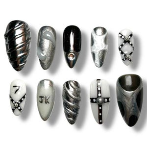 Presse SEVEN -JK sur les ongles