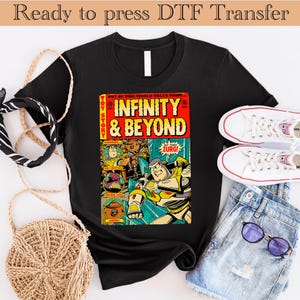 May include: A black t-shirt with a vintage comic book design featuring Buzz Lightyear and the text "Toy Story Infinity & Beyond".