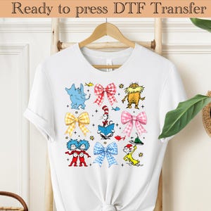 Przeczytaj Across America DTF Transfer, Czytanie Przyjaciół Dtf, Coquette Cartoon Czytanie Dtf, Nadchodzą Kłopoty Dtf, W Miejscach, Do Których Się Udasz Koszulka Dtf