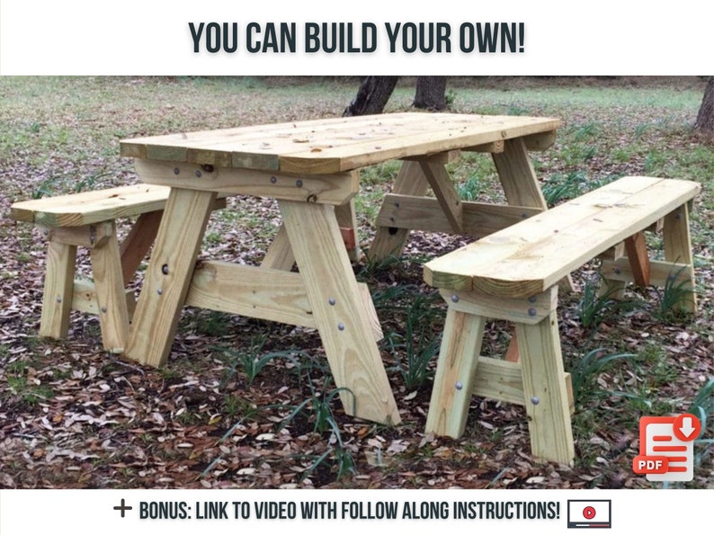 May include: A wooden picnic table with two benches. The table and benches are made of unfinished wood and have a rustic look. The table is set up in a grassy area with leaves on the ground. The text "YOU CAN BUILD YOUR OWN!" is at the top of the image. The text "+ BONUS: LINK TO VIDEO WITH FOLLOW ALONG INSTRUCTIONS!" is at the bottom of the image. There is a PDF icon with a download arrow in the bottom right corner of the image.