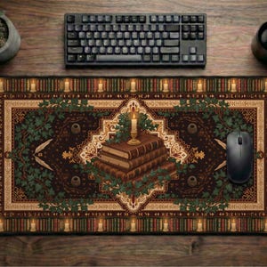 May include: A rectangular desk mat featuring a dark brown background with a central stack of three books topped by a lit candle. The border displays a repeating pattern of vertical book spines and glowing candles, accented by green ivy leaves.