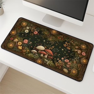 May include: A rectangular desk mat featuring a dark green forest floor scene framed by a brown wooden border with circular accents. The design includes various mushrooms, colorful wildflowers, and small glowing lights scattered throughout.