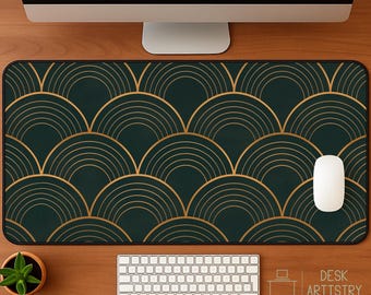May include: A rectangular desk mat featuring a dark green background with a repeating pattern of gold-colored concentric semicircles. The mat has a black stitched border and is positioned on a wooden surface with a white computer mouse.