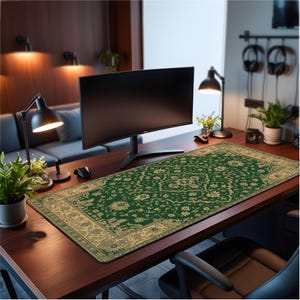 A printed emerald rug style desk mat featuring an ornate Persian floral pattern in gold on a deep green background, designed for a vintage and classic look.