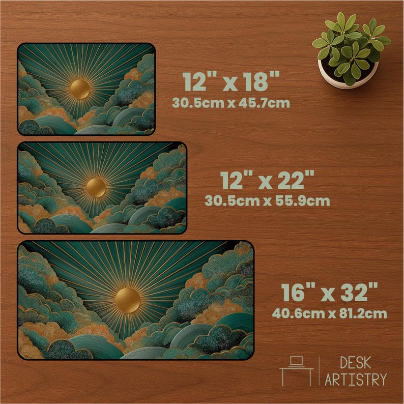 May include: Three rectangular desk mats featuring a gold sun with radiating rays above teal and gold clouds. Sizes are 12 by 18 inches, 12 by 22 inches, and 16 by 32 inches. The text Desk Artistry is visible in the bottom right corner.