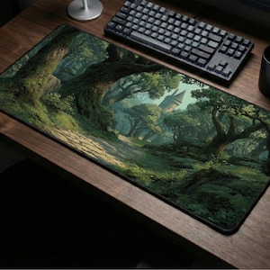 May include: A rectangular mousepad featuring a detailed forest scene with a path leading towards a castle. The artwork showcases lush green trees, a stone path, and a castle in the distance. The mousepad is on a wooden desk with a keyboard, mouse, and a black mug.