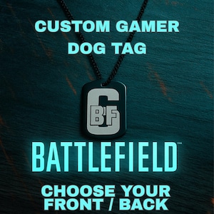 May include: A black dog tag with the text "CUSTOM GAMER DOG TAG" and the "BF" logo. The word "BATTLEFIELD" is displayed below the dog tag, with the text "CHOOSE YOUR FRONT / BACK" at the bottom.