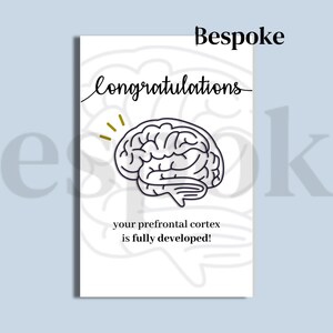 May include: A white card with a black and white illustration of a brain. The card says "Congratulations, your prefrontal cortex is fully developed!" and "Bespoke" at the top.