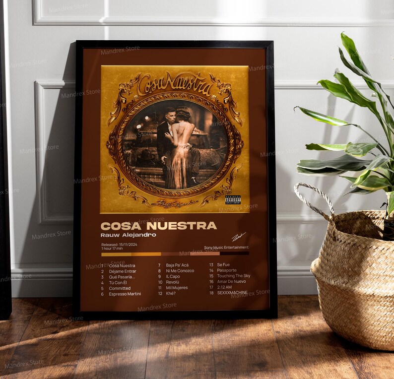 May include: A brown and gold album cover with the title "Cosa Nuestra" by Rauw Alejandro. The album cover features a couple in a romantic embrace. The album tracklist is listed on the right side of the cover.