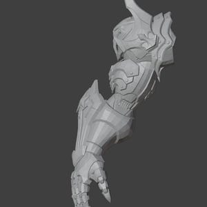 May include: A gray, 3D-rendered arm and hand, showcasing intricate armor details. The design features segmented plates, sharp edges, and a prominent spike on the shoulder, suggesting a fantasy or sci-fi theme.