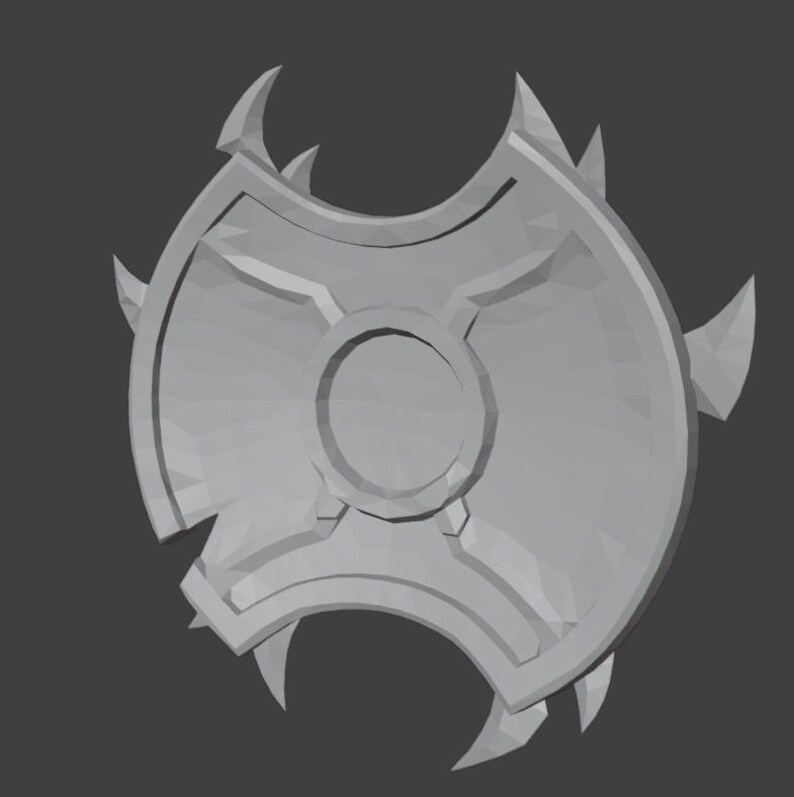 May include: A gray, spiky shield with a circular center and a three-pointed design.