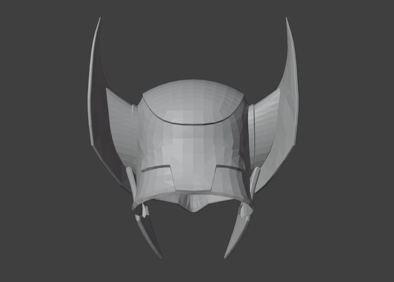 K&ouml;nnte beinhalten: Ein grauer 3D-gedruckter Helm mit zwei gro&szlig;en, spitzen Ohren an den Seiten. Der Helm hat ein geometrisches Design und eine glatte, matte Oberfl&auml;che.