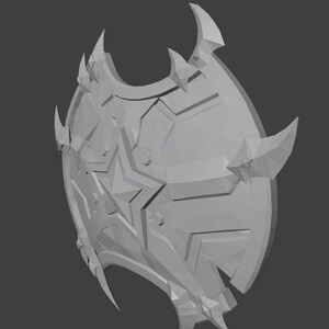 May include: A gray, 3D-printed shield with a star design and a spiky, jagged edge.
