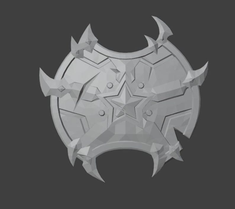 May include: A gray, star-shaped shield with a five-pointed star in the center and sharp, pointed edges.