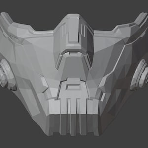 May include: A gray, futuristic-looking mask with a geometric design. The mask has a large, central opening for the mouth and nose, and two smaller openings on either side for the eyes. The mask is made of a smooth, hard material.