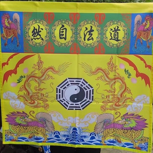 May include: Yellow banner with Chinese characters and ornate illustrations. The top section features green and red accents with circular designs and text. The lower section displays dragons, a yin-yang symbol, and mythical creatures in vibrant colours.