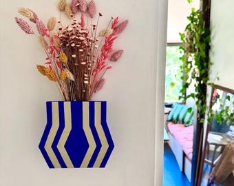Painted wooden wall vase for dried flowers