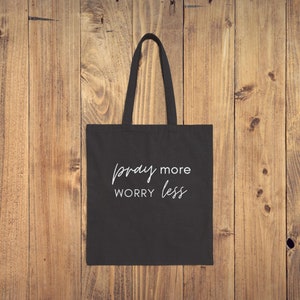 black tote bag, Cotton canvas shopping bag, Eco-friendly reusable bag, Durable everyday tote, Positive message tote, Faith quote tote bag, printed canvas bag, Black and natural tote bag, Heavy fabric tote bag Pray More Worry Less printed bag