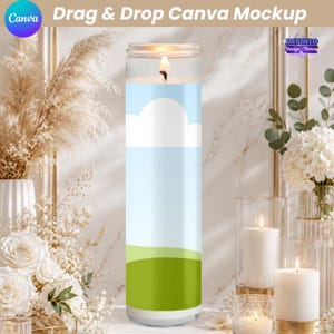 May include: A tall cylindrical glass prayer candle featuring a printed label with a light blue sky, white clouds, and a green grassy field. The candle is lit, showing a small flame at the top, and is presented as a digital design mockup.