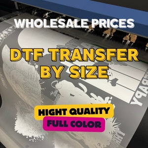 May include: A white DTF transfer sheet with a design printed on it. The sheet is being fed into a large format printer. The text "Wholesale Prices" is at the top of the image. The text "DTF Transfer By Size" is in the center of the image. The text "Hight Quality Full Color" is in a pink box at the bottom of the image.