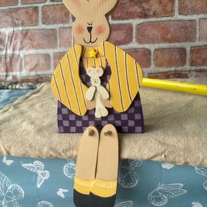 handcrafted wooden bunny shelf sitter with dangling legs