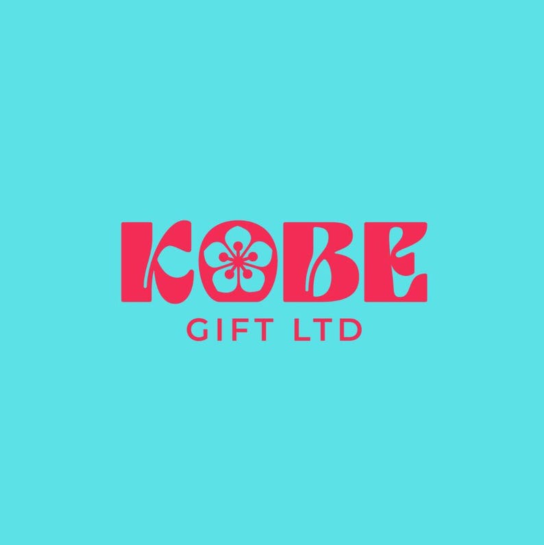 May include: A logo for Kobe Gift LTD in a bold, stylized font. The word "KOBE" is in red, with a flower graphic in the "O". The text "GIFT LTD" is below in a smaller, red font, set against a teal background.