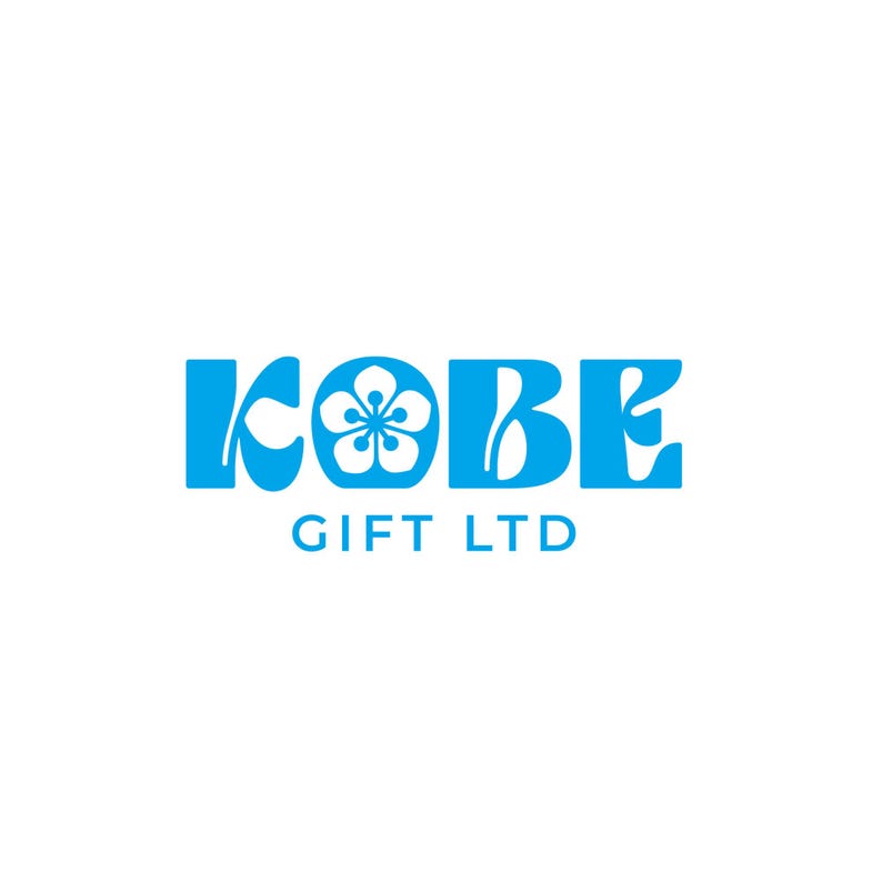 May include: A blue logo on a white background. The word "KOBE" is in stylized blue letters, with a flower graphic replacing the "O". Below, in smaller blue letters, is "GIFT LTD".