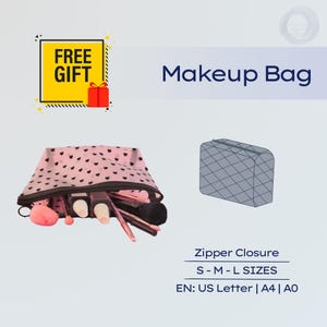May include: Pink makeup bag with black heart pattern, open to display makeup brushes and applicators. The image also shows a drawing of a gray makeup bag, and text that says "Makeup Bag", "Zipper Closure", and "S-M-L SIZES".
