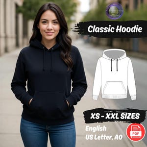 May include: A woman wearing a black classic hoodie with a front pocket and a drawstring hood. The image includes a line drawing of the hoodie and text that reads "Classic Hoodie" and "XS - XXL SIZES".