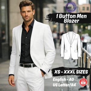 Op de afbeelding: Een witte blazer met één knoop, gecombineerd met een witte broek en een zwart overhemd. De afbeelding bevat een technische tekening van de blazer en de tekst "1 Button Men Blazer" en "XS - XXXL SIZES".
