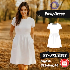 May include: A white, short-sleeved dress with a round neckline and pockets. The dress is shown on a person outdoors. The image includes the text "Easy Dress" and "XS - XXL SIZES". A PDF icon is also visible.