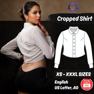 May include: A digital sewing pattern for a cropped shirt. The pattern includes sizes XS-XXXL and is available in English. The pattern is printed on A4 size paper and is in A0 format. The pattern is for a white long-sleeved shirt with a button-up front.