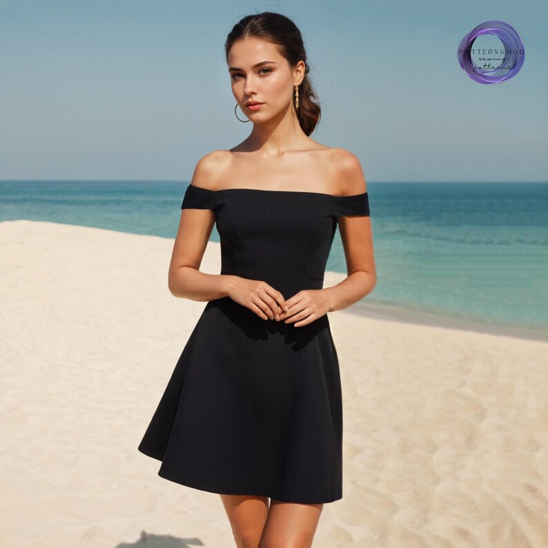 May include: A black off-the-shoulder dress with a flared skirt. The dress is knee-length and has a fitted bodice. The background is a beach with the ocean in the distance.