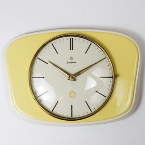 Junghans Pastel Yellow Max Bill Style Midcentury Wall Clock, Germany, 1950s