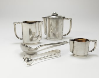 Gio Ponti para tetera/cafetera, jarra, crema, pinzas para azúcar y cucharón de plata Krupp, años 30 Art Déco