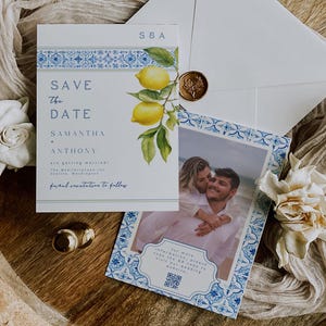 May include: Save the date card with a blue and white tiled border, a lemon branch illustration, and a photo of a couple. The card says "Save the Date - Samantha & Anthony are getting married!" and includes a QR code.