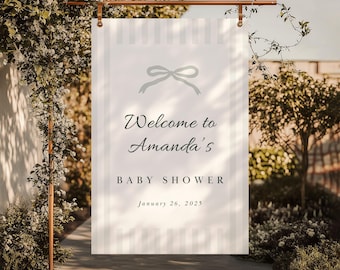 May include: White banner with gray stripes and a gray bow. The banner reads "Welcome to Amanda's Baby Shower January 26, 2025".