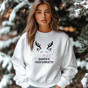 Santa s Main Character Unisex Heavy Blend™ Crewneck Sweatshirt - Funny Reindeer Face Cozy Christmas Holiday Sweater