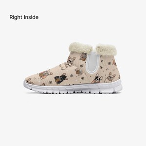May include: Tan ankle boot with a repeating pattern of French bulldogs in various poses. The boot has a white sole, a white elastic side panel, and a fluffy, cream-colored trim around the ankle. The words "Right Inside" are printed on the upper left.