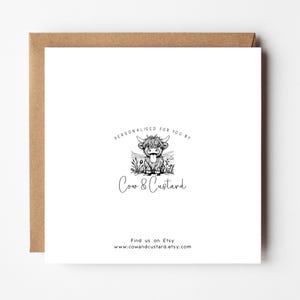 May include: A white card with a black and white illustration of a Highland cow with its tongue sticking out. The text "Personalized for you by Cow & Custard" is below the illustration. The text "Find us on Etsy www.cowandcustard.etsy.com" is at the bottom of the card.