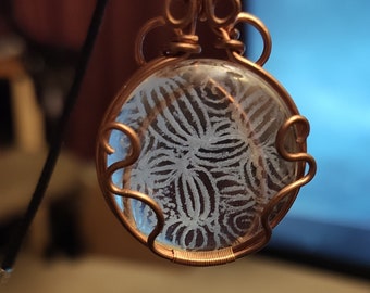 Wire-wrapped engraved glass pendant, handmade copper jewelry