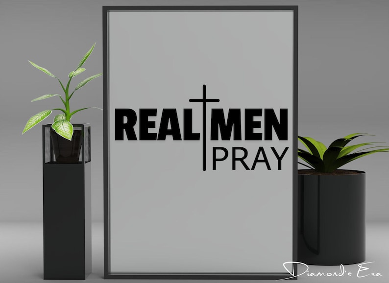 May include: Black and white framed print with a cross and the text "REAL MEN PRAY".