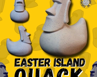 May include: A white rubber duck shaped like a Moai statue from Easter Island. The duck has a large head and a small body. The text "Easter Island Quack" is printed in black on a yellow background.