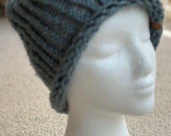 Handmade gray blue knitted hat. Made with love by 10-year old girl.