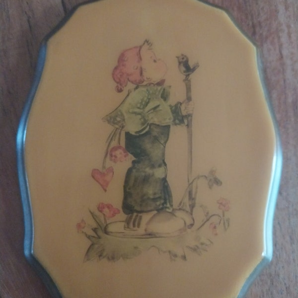 Small Vintage Boy with Bird Bakelite Wall Plaque - 1930s Era