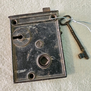 May include: A set of three ceramic mugs with a speckled, matte finish. The mugs are in shades of cream, light gray, and dark gray. Each mug has a simple, minimalist design and a rounded handle. Perfect for coffee or tea.